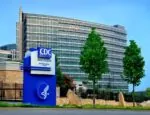 new autism rate data article illustrated by CDC building
