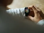 Person looking at smartwatch on their wrist via over the shoulder viewpoint Image by fancycrave1 from Pixabay